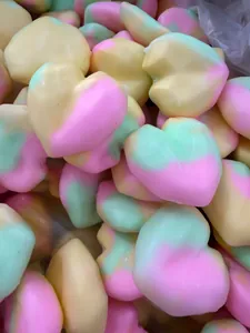 Close-up detail of multi-colored heart-shaped squishy toys for stress relief in a pile