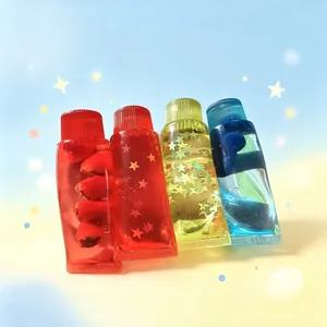 Jouets à presser en forme de dentifrice transparents avec liquide pour déstresser