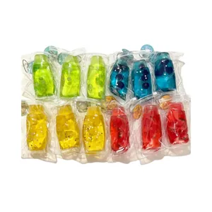 Jouets anti-stress transparents en forme de dentifrice avec morceaux de fruits