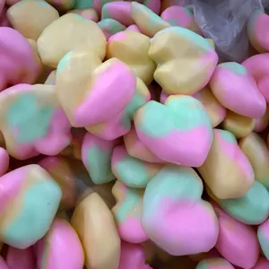 Bulk colorful heart-shaped squishy toys in pastel pink and green for stress relief