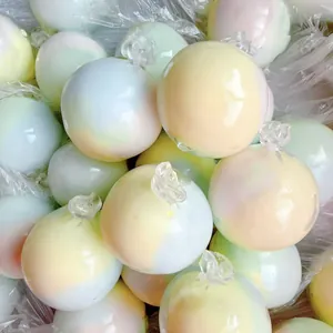 Detail shot showing multiple pastel gradient handmade squeeze balls for stress relief