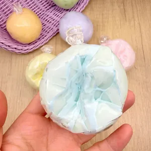 Close-up of a blue gradient crispy stress relief squishy ball toy for anxiety relief