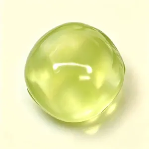 Balle anti-stress spongieuse vert citron translucide pour le jeu et la détente