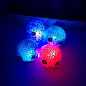 Close-up view of LED glowing octopus stress toys featuring colorful inner beads and soft texture