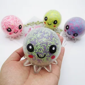 Macro view of octopus squeeze toy showing colorful beads and cute facial design