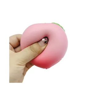 Zachte roze perzik squishy speelgoed van PU-schuim om in te knijpen tegen stress