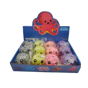 12pcs colorful glowing octopus squeeze toys in a blue display box for stress relief