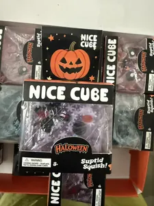 Detail view of NICE CUBE Halloween pumpkin and ghost themed squishy toys in retail boxes.