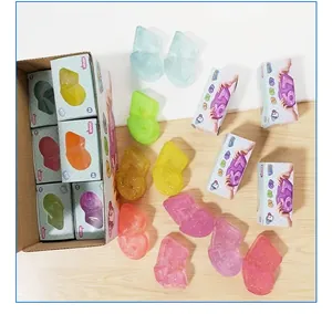 Macro view of colorful 67 number shaped TPR squishy stress relief toys in boxes