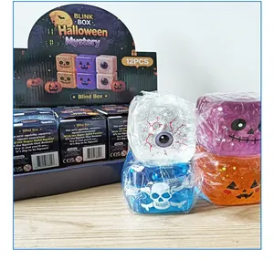 Detailopname van Halloween glitter squishy speeltjes en Blink Box verpakking