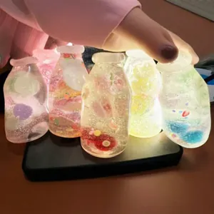 Leuchtendes Malzzucker-Drifting-Flaschen-Squishy-Spielzeug zum Stressabbau und Spaß