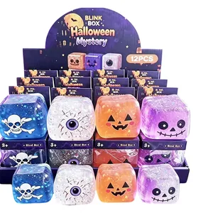 Set van 12 Halloween vierkante glitter knijpspeeltjes met LED in een mystery box