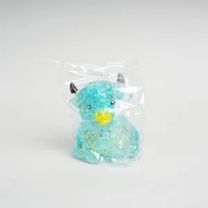 Süßes blaues Glitzer Hochlandrind Squishy Stressspielzeug in einer Plastiktüte