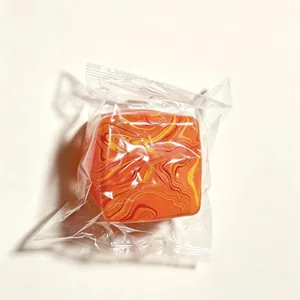 Square marble pattern stress relief squishy toy presented in transparent individual packaging