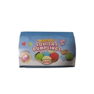 12-piece mystery squishy dumplings stress relief toy set in colorful packaging for ages 3 plus
