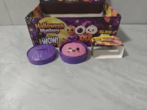 Halloween mystery blind box squeeze toy in pink baozi shape with purple steamer tray
