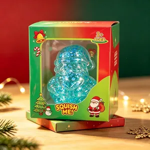 Close-up of a blue glitter Santa Claus squishy stress relief toy in Christmas themed packaging