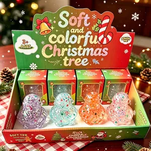 Set of colorful Santa Claus squishy toys presented in a festive Christmas display box