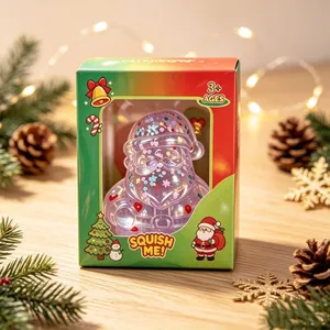 Purple glitter Santa Claus Christmas squishie stress toy in festive window box packaging