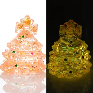 Jouet à presser en forme de sapin de Noël en TPR phosphorescent avec paillettes
