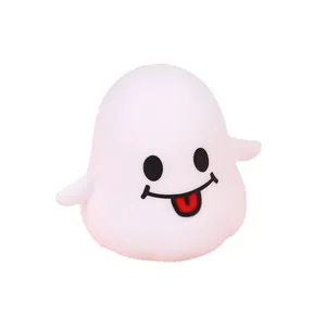Cute white Halloween ghost squishy toy with tongue out, slow rebound stress relief toy