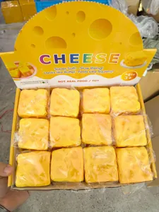 Κουτί παρουσίασης με 12 κίτρινα παιχνίδια squishy τυρί από αφρό PU αργής επαναφοράς