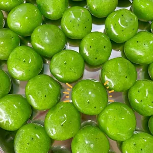 Balle anti-stress en forme de sorbet au kiwi vert pour expérience sensorielle ASMR