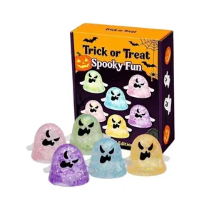 Set of five colorful Halloween glitter ghost squeeze toys in a spooky themed gift box