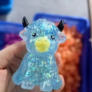 Giocattolo antistress mucca glitterata blu con finitura traslucida