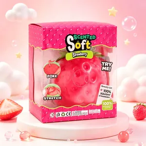 Close-up of scented strawberry squishy toy in pink retail packaging