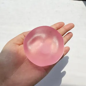 Gioco antistress rosa traslucido rotondo e morbido per il relax delle mani e l'esercizio