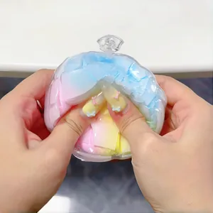 Macro view of colorful crispy wax squishy toy being squeezed for tactile stress relief
