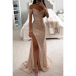 Elegant rose gold sequined off-shoulder prom gown featuring a high side slit detail.