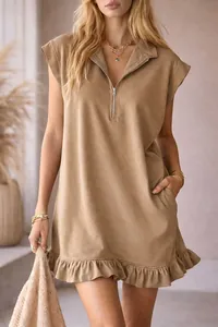 Detail view of khaki sleeveless dress with V-neck zipper and stylish ruffle hem