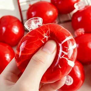 Roter Apfel Knusperhaut Quetschspielzeug zum Stressabbau mit zufriedenstellendem Knacken