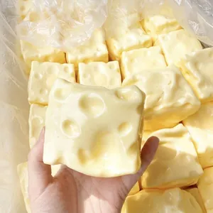 Close-up detail of realistic cheese-shaped squishy toy for stress relief and sensory play
