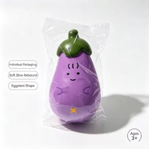 Macro detail of purple cartoon eggplant squishy toy with cute face in clear packaging bag