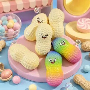 Close-up of cute peanut-shaped PU squishy toys in rainbow and beige colors