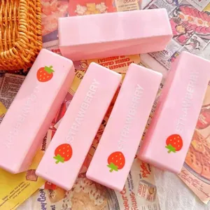 Macro view of pink rectangular strawberry slow-rising squishy toy for stress relief