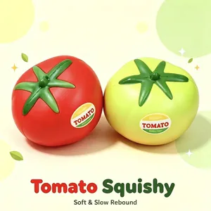 Pair of red and lime green tomato squishy toys featuring slow rebound PU texture