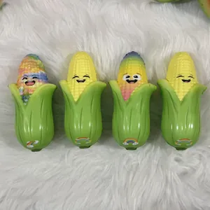 Close-up of four colorful corn squishy slow rebound toys with cute smiling faces