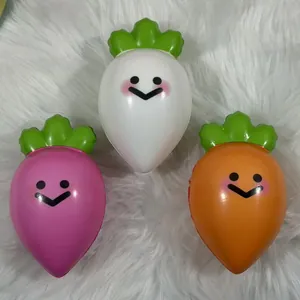 Close-up of three colorful carrot-shaped slow-rising squishy stress relief toys