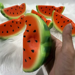 Close-up showing the soft slow-rebound texture of a watermelon squishy toy.