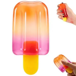 Close-up detail of a slow-rebound popsicle squeeze toy being hand-pressed for stress relief