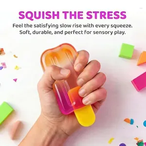 Detail of a colorful popsicle squishy toy being squeezed for slow rebound stress relief.