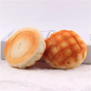 Realistic PU slow-rebound pineapple bun squishy toy with lifelike soft bread texture