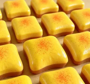 Close-up macro view of multiple butter toast bread slow rebound squishy stress relief toys