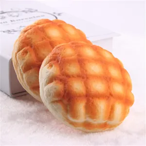 Detailed view showing the realistic texture of the PU slow rebound pineapple bun squishy toy.