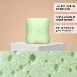 Macro view of light green slow-rebound toast squishy toy showing its porous material texture.