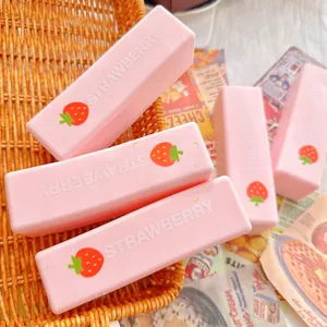 Close-up of cute pink strawberry milk bar slow rising squishy toy for stress relief